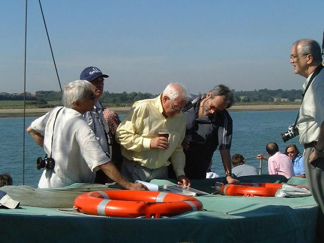 Brian Workman poring over the memorabilia .....